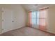 Bedroom with natural light and carpet, perfect for rest and relaxation with natural light at 879 Tranquil Way, Hampton, GA 30228