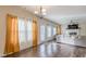 Bright living room with natural light and a view of the fireplace at 879 Tranquil Way, Hampton, GA 30228