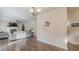 Cozy living space featuring hardwood floors and comfortable furniture at 879 Tranquil Way, Hampton, GA 30228