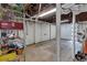 Unfinished basement offers potential for customization and storage with an overhead door at 935 Cumberland Ne Rd, Atlanta, GA 30306