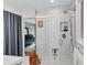 Contemporary bathroom with a glass-enclosed shower, sleek fixtures, and ample storage at 935 Cumberland Ne Rd, Atlanta, GA 30306