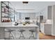 Modern kitchen featuring stainless steel appliances, sleek countertops, and bar seating at 935 Cumberland Ne Rd, Atlanta, GA 30306