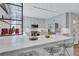 Modern kitchen with gray cabinets, stainless steel appliances, and a spacious white countertop island at 935 Cumberland Ne Rd, Atlanta, GA 30306