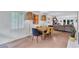 Open-concept living space with hardwood floors, modern decor, and large windows offering scenic views at 935 Cumberland Ne Rd, Atlanta, GA 30306