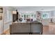 Bright and airy living area featuring hardwood floors, modern furnishings, and views into the backyard at 935 Cumberland Ne Rd, Atlanta, GA 30306