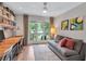 Bright home office with built-in bookshelves, large windows, and comfortable seating, perfect for remote work at 935 Cumberland Ne Rd, Atlanta, GA 30306