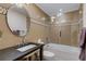 Stylish bathroom featuring a glass-enclosed shower, modern sink, and neutral-toned tiling at 2375 Hyde Park Nw Ct, Atlanta, GA 30318