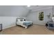 Bright bedroom featuring neutral colors, plush carpet, and natural light at 2375 Hyde Park Nw Ct, Atlanta, GA 30318