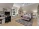 Bedroom with window seat, desk, and contemporary furnishings at 2375 Hyde Park Nw Ct, Atlanta, GA 30318