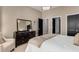 Bedroom features dark wood dresser and black doors and trim at 2375 Hyde Park Nw Ct, Atlanta, GA 30318