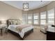 Well-lit bedroom with neutral colors and a luxurious bed at 2375 Hyde Park Nw Ct, Atlanta, GA 30318