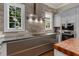 Modern kitchen featuring a stainless steel range hood and built in oven at 2375 Hyde Park Nw Ct, Atlanta, GA 30318
