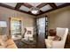 Cozy living room with coffered ceiling, hardwood floors, and comfortable seating at 2375 Hyde Park Nw Ct, Atlanta, GA 30318