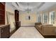 Sitting room features a chandelier, hardwood floors, and natural light from multiple windows at 2375 Hyde Park Nw Ct, Atlanta, GA 30318