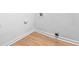 Clean laundry room with washer/dryer hookups and modern flooring at 264 Howell Sw Ter, Atlanta, GA 30331