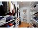 Organized walk-in closet with shelving and storage solutions, leading to the bathroom at 2023 Oakview Se Rd # 226, Atlanta, GA 30317