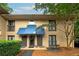 Charming brick townhome with private entrances and small balconies, showcasing its inviting facade at 2023 Oakview Se Rd # 226, Atlanta, GA 30317