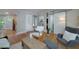 Spacious living area featuring hardwood floors and a view towards the kitchen and bathroom at 2023 Oakview Se Rd # 226, Atlanta, GA 30317