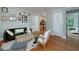 Cozy living room showcasing hardwood floors and an inviting view into the kitchen at 2023 Oakview Se Rd # 226, Atlanta, GA 30317