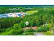 Aerial view showcases the home's location near schools and lush green spaces at 3150 Stratford Green Pl, Avondale Estates, GA 30002