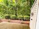 A backyard featuring a shed and green landscaping at 3150 Stratford Green Pl, Avondale Estates, GA 30002