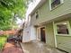 A backyard with a patio and well-maintained landscaping at 3150 Stratford Green Pl, Avondale Estates, GA 30002