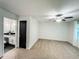 Neutral bedroom features include plush carpeting, ceiling fan, and adjacent full bathroom at 3150 Stratford Green Pl, Avondale Estates, GA 30002