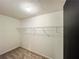 Walk-in closet with carpet floors and open shelves for optimal storage at 3150 Stratford Green Pl, Avondale Estates, GA 30002