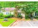Charming townhouse exterior with well-manicured landscaping and inviting entrance at 3150 Stratford Green Pl, Avondale Estates, GA 30002