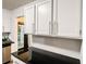 Kitchen cabinets with silver hardware provide ample storage space at 3150 Stratford Green Pl, Avondale Estates, GA 30002