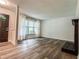 Cozy living room with hardwood floors, fresh paint, and lots of sunlight at 3150 Stratford Green Pl, Avondale Estates, GA 30002