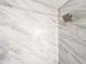 Beautiful bathroom featuring a shower with marble-look tiles and a modern showerhead at 3150 Stratford Green Pl, Avondale Estates, GA 30002