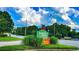 Stratford Green Townhomes sign with lush green landscaping and mature trees at 3150 Stratford Green Pl, Avondale Estates, GA 30002