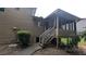 An enclosed, screened-in back porch accessible by stairs at 3778 Glen Mora Dr, Decatur, GA 30032