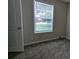 A bedroom with freshly painted walls and carpeted floors at 3778 Glen Mora Dr, Decatur, GA 30032