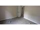Bedroom showcasing neutral walls, carpet, and a closet with double doors at 3778 Glen Mora Dr, Decatur, GA 30032
