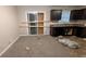 Kitchen and dining space with dark wood cabinets and black appliances at 3778 Glen Mora Dr, Decatur, GA 30032