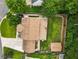 A birds eye view of a home with a large yard, showing the driveway and proximity to other homes at 4903 Wilkie Nw Way, Acworth, GA 30102