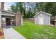 Large backyard with outdoor kitchen and living area and detached storage shed at 4903 Wilkie Nw Way, Acworth, GA 30102