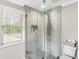 Bathroom featuring a glass shower and gray tiled floor at 4903 Wilkie Nw Way, Acworth, GA 30102