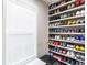Walk-in closet featuring a window and custom shelving for shoe storage at 4903 Wilkie Nw Way, Acworth, GA 30102