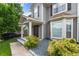 Lovely gray home featuring manicured landscaping, gray gravel, and a charming covered front porch at 4903 Wilkie Nw Way, Acworth, GA 30102