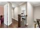 Bright hallway featuring hardwood floors and a bedroom view adds to the home's charm at 4903 Wilkie Nw Way, Acworth, GA 30102