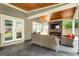 Relaxing outdoor living area with wood ceiling, fireplace and TV at 4903 Wilkie Nw Way, Acworth, GA 30102