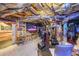 Basement entertainment area showcasing a vintage bar, stage lighting and music equipment for fun gatherings at 750 Old Loganville Road Southwest, Loganville, GA 30052