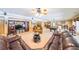Large finished basement boasts a leather sofa, pool table, and built-in entertainment center for recreation at 750 Old Loganville Road Southwest, Loganville, GA 30052