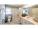 Bathroom featuring a walk-in shower and vanity with sink at 750 Old Loganville Road Southwest, Loganville, GA 30052