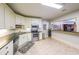 Kitchen with stainless steel appliances, breakfast bar, and view to living area at 750 Old Loganville Road Southwest, Loganville, GA 30052
