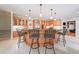 Spacious kitchen with stainless appliances, large island and pendant lighting at 750 Old Loganville Road Southwest, Loganville, GA 30052