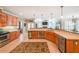 Open concept kitchen with stainless steel appliances and a breakfast bar at 750 Old Loganville Road Southwest, Loganville, GA 30052